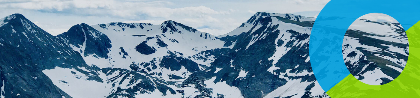 Snow-covered mountain range with branding overlay.