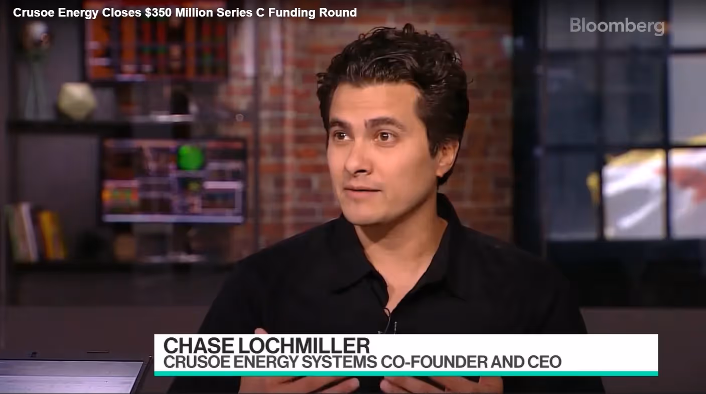 Photo of Chase Lochmiller, Co-Founder and CEO of Crusoe, being interviewed on Bloomberg after closing $350M in Series C Funding Round.