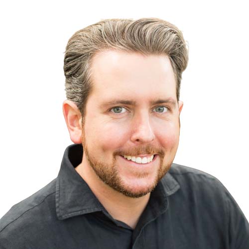 A professional headshot of Patrick McGregor.