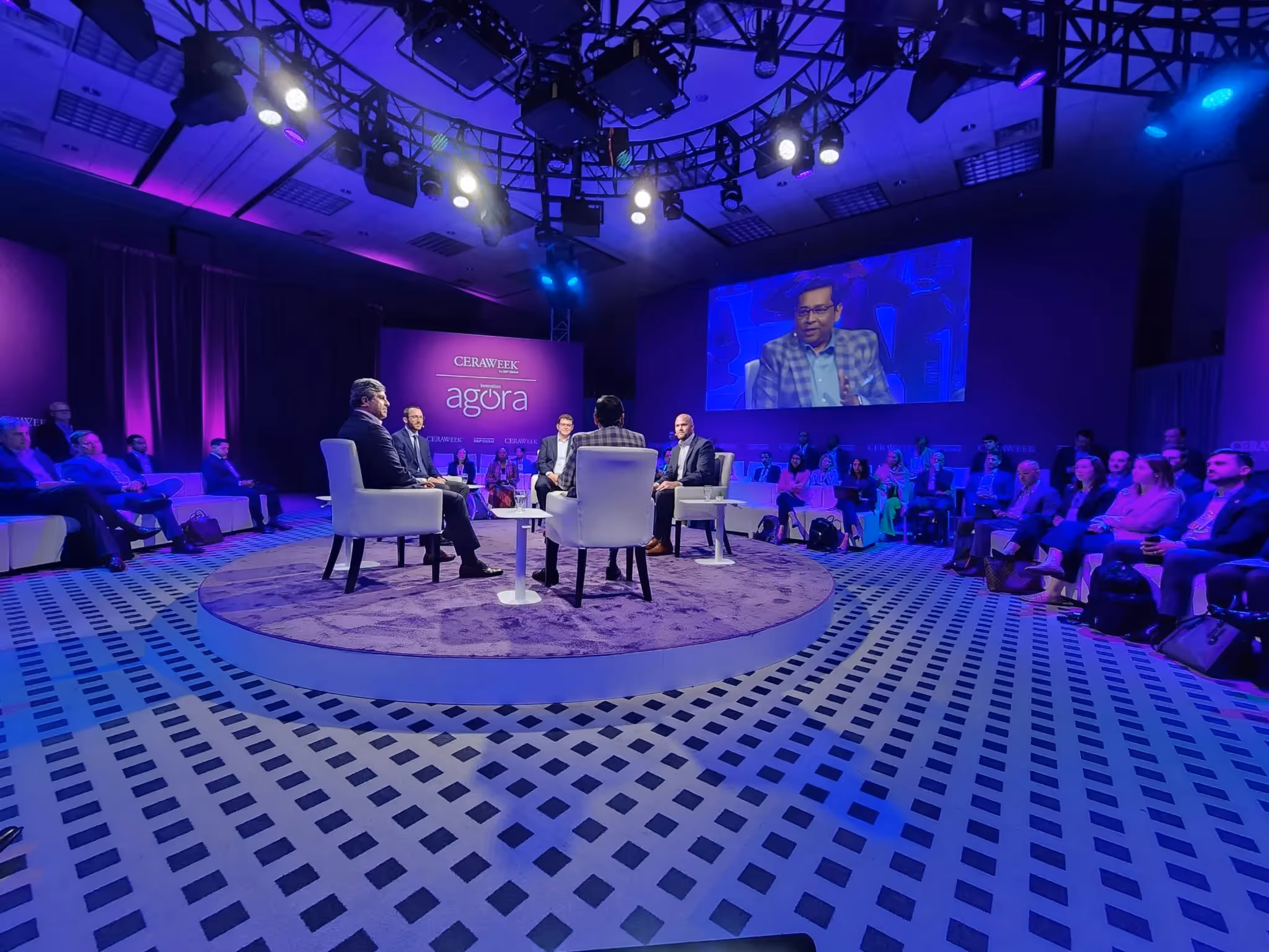 Photo from the stage at CERAWeek where AES CCO Kleber Costa discussed AI's growing energy demand and the need for renewable solutions.