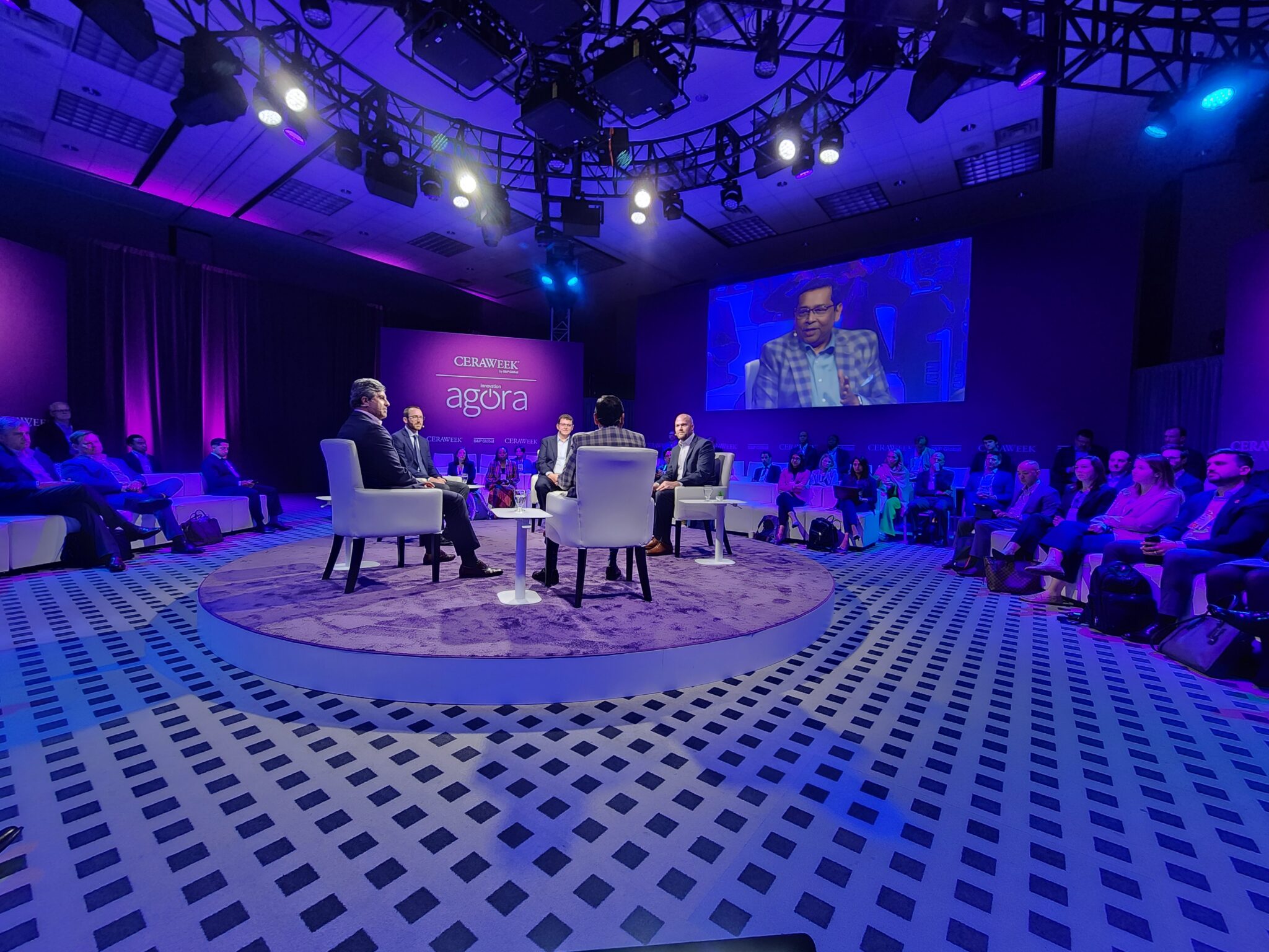 Photo from the stage at CERAWeek where AES CCO Kleber Costa discussed AI's growing energy demand and the need for renewable solutions.
