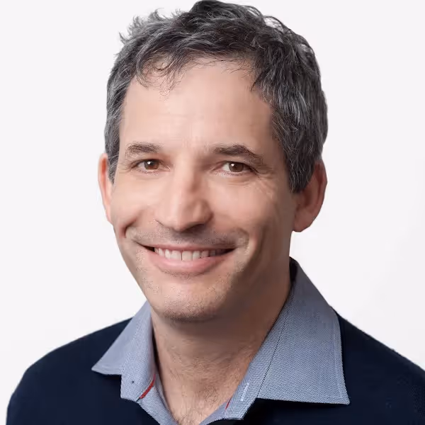 Headshot of Nadav Eiron, Crusoe's Senior Vice President of Cloud Engineering.
