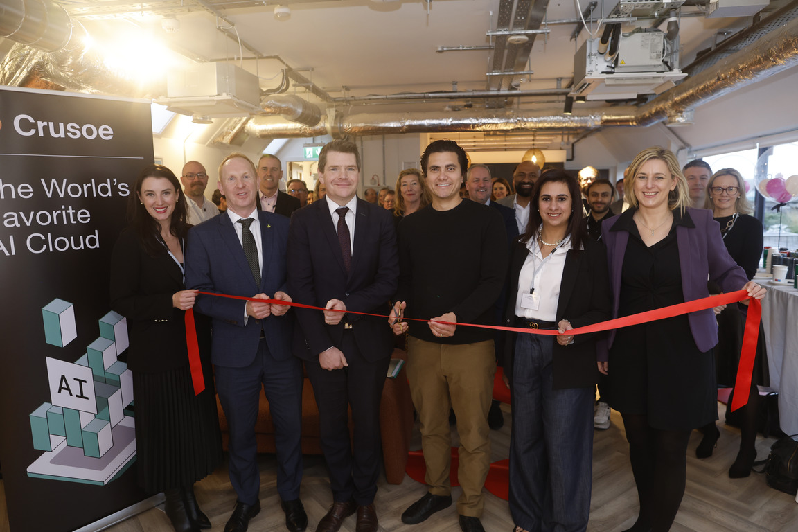 Photo of a ribbon-cutting ceremony celebrating the launch of Crusoe's new facility.