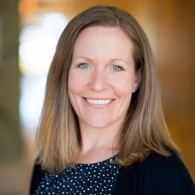 Headshot of Sarah Irving, VP, Real Estate Operations