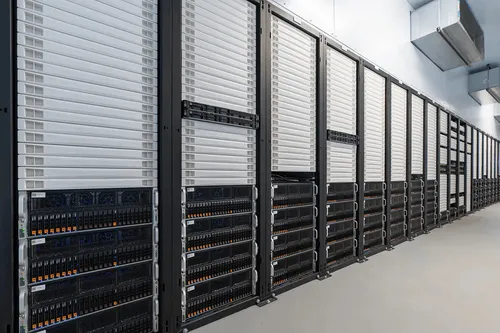 Photo of Crusoe's energy-efficient data center showing rows of GPU servers, designed for cloud computing and AI workloads.