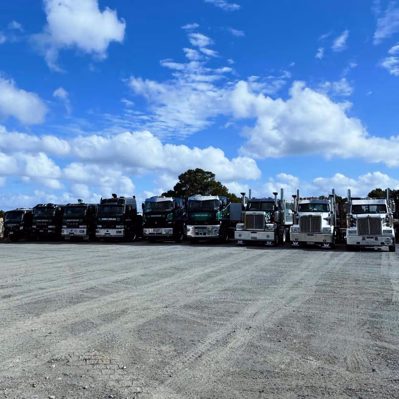 Trucks and excavators in Auckland fleet, providing earthmoving and transport construction services. Hambly Haulage