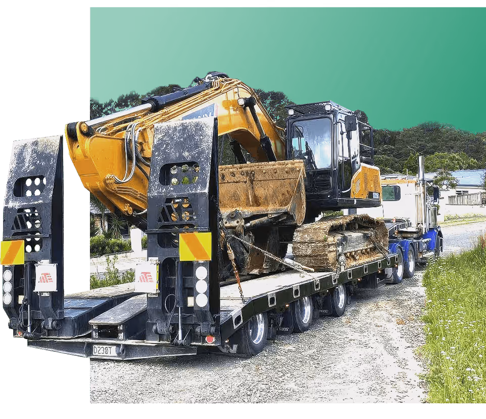 Heavy machinery transportation through industrial site featuring large trucks and trailers hauling equipment efficiently.