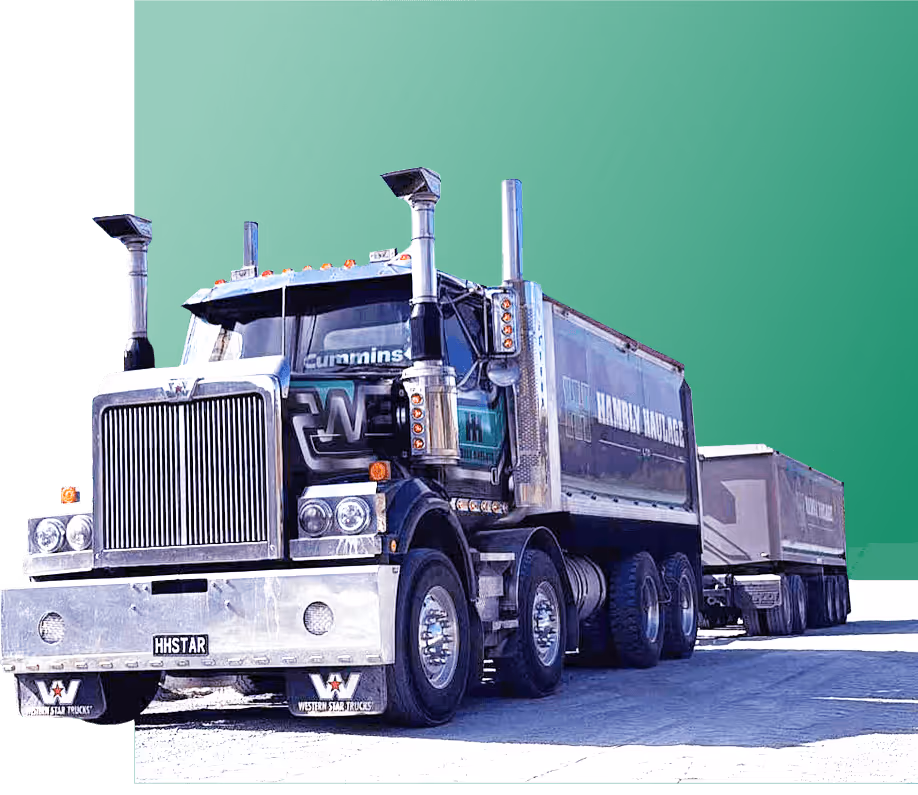 Auckland's leading earthmoving transport service utilising heavy haulage trucks with equipment trailers for construction. Hambly Haulage