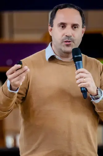 Andrea Cordani from AirBnb speaking