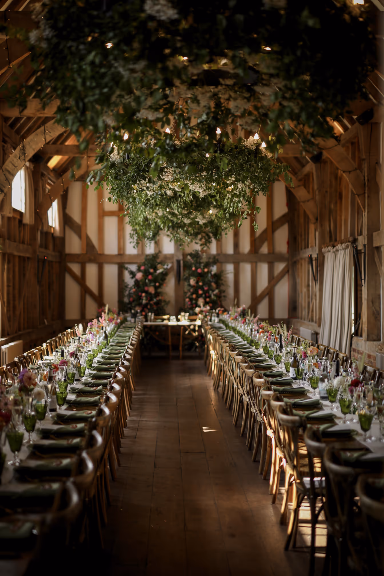 Wedding venue dining area with lush greenery