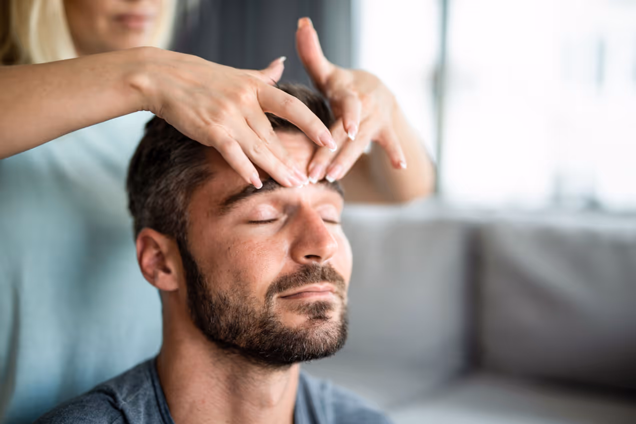 Man getting a sensual head massage