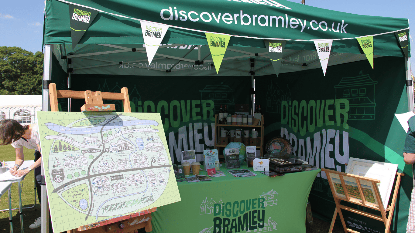The Discover Bramley branded tent with bunting and decorations at the Bramley Fete
