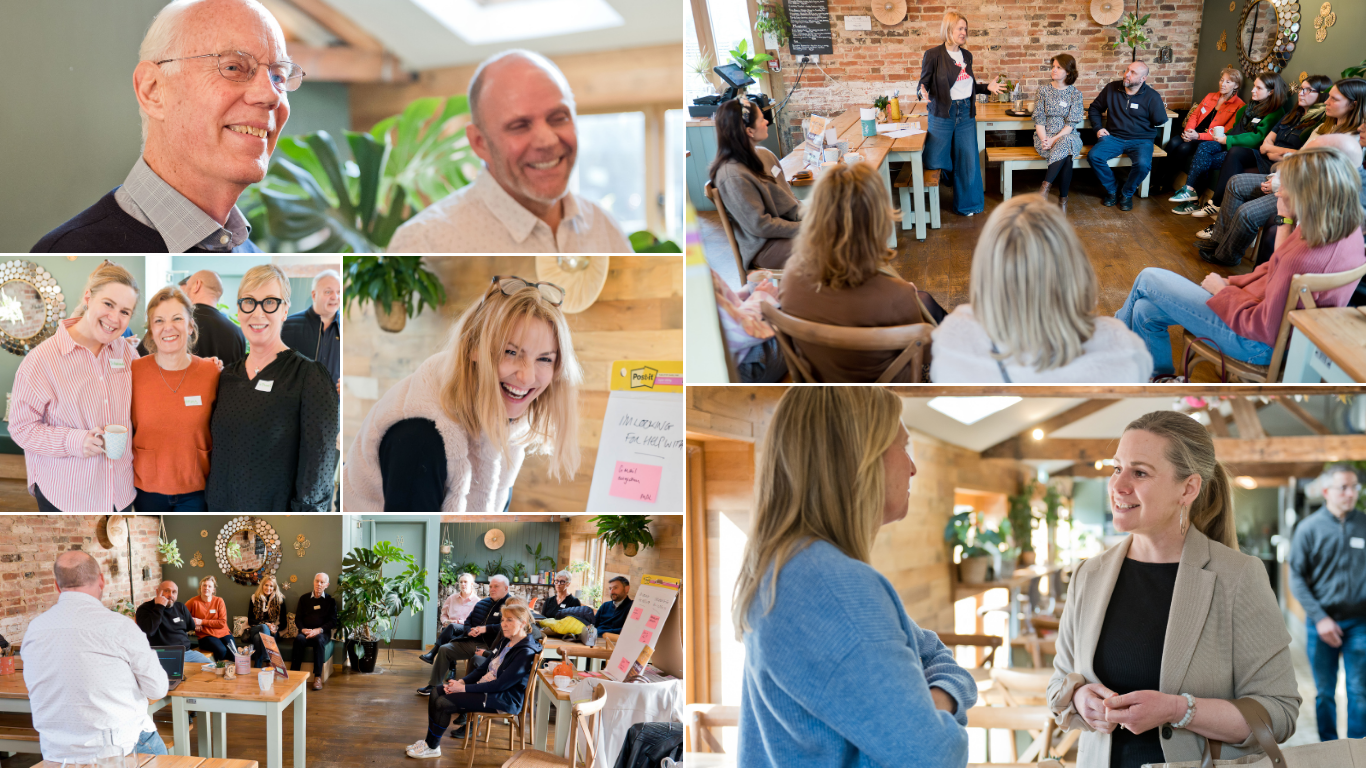 A group of adults engage in conversation, presentations, and networking activities in a bright, cozy indoor setting.