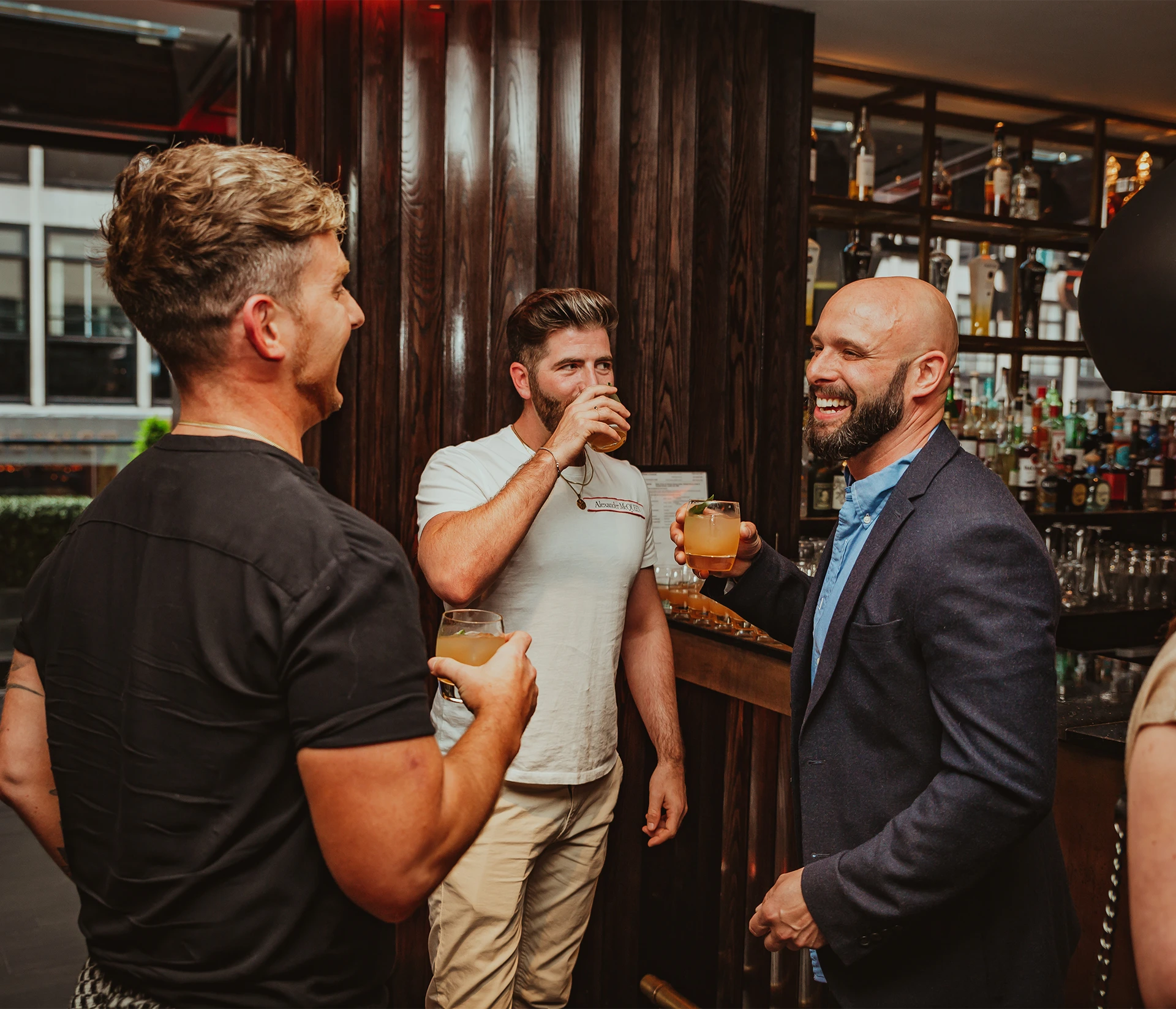 People happy drinking tequila