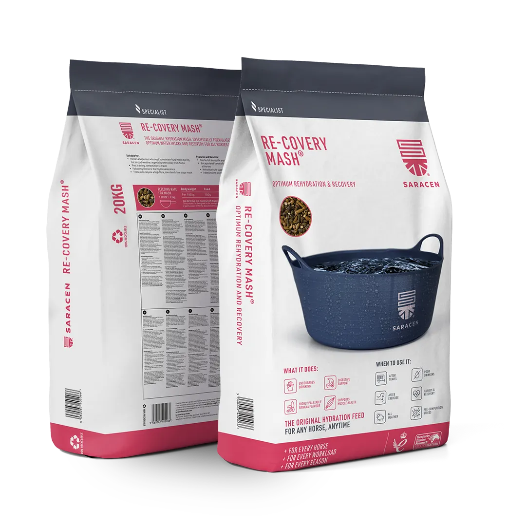 Two white and pink bags of Saracen Horse Feeds Re-Covery Mash horse feed with an image of a water-filled blue bucket on the front bag.