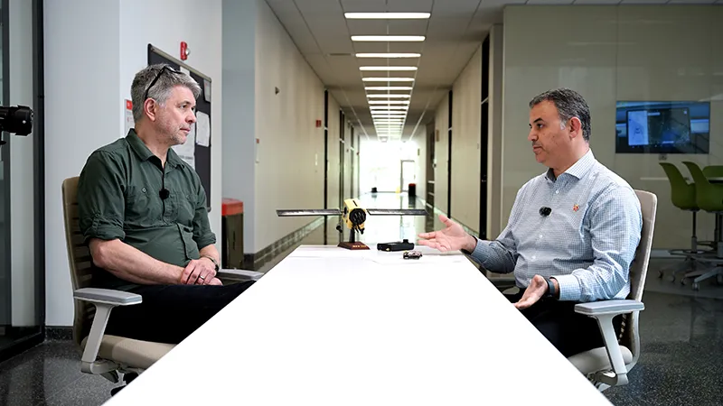 CARNATIONS team members discussing transportation project findings during an interview