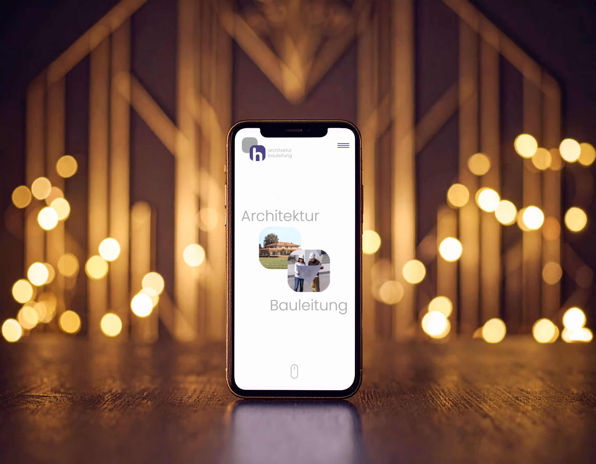 Smartphone zeigt die mobile Website für "hutter architektur bauleitung" mit den Menüpunkten "Architektur" und "Bauleitung".