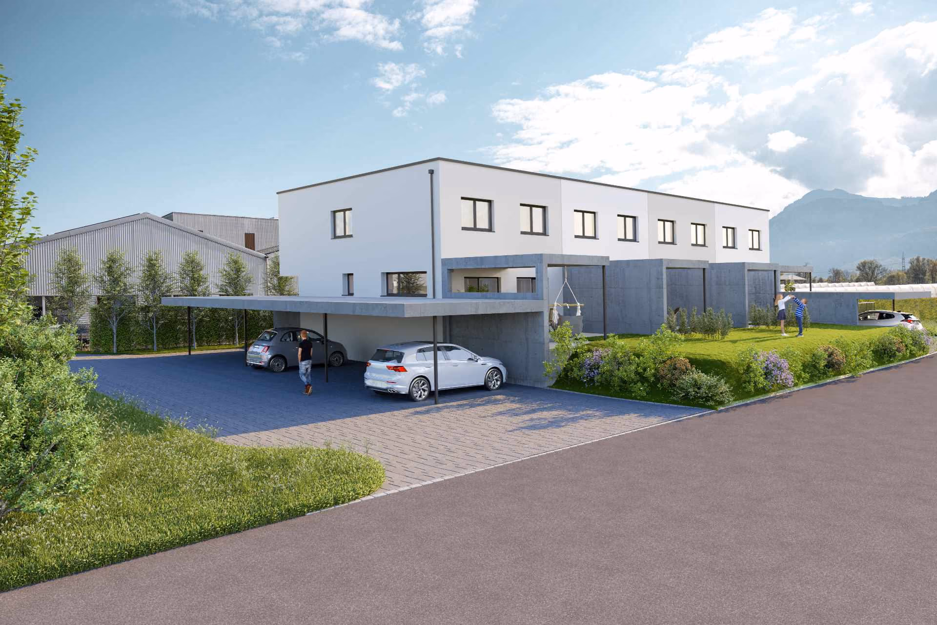 Aussenansicht Südwest mit mehreren Carports, Gartenbereich und spielenden Kindern auf der Wiese