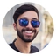 A guy wearing sunglasses.