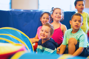 Kids playing at camp in a sensory gym