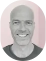 Robin Chalesworth headshot on a pink background.