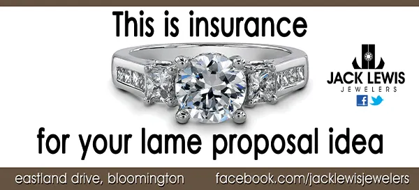 An advertising campaign billboard from 2011 that features a  diamond engagement ring and says "This is insurance for your lame proposal idea"