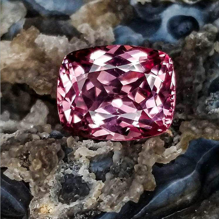 rectangular magenta colored spinel gemstone with rounded edges