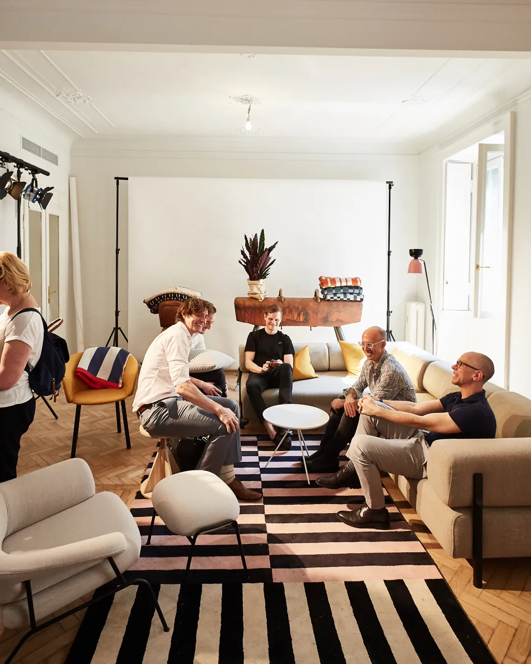 professional photography studio situation with a group of people discussing