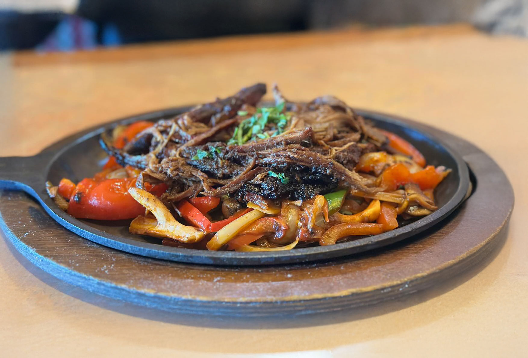 A plate of smoked brisket fajitas.