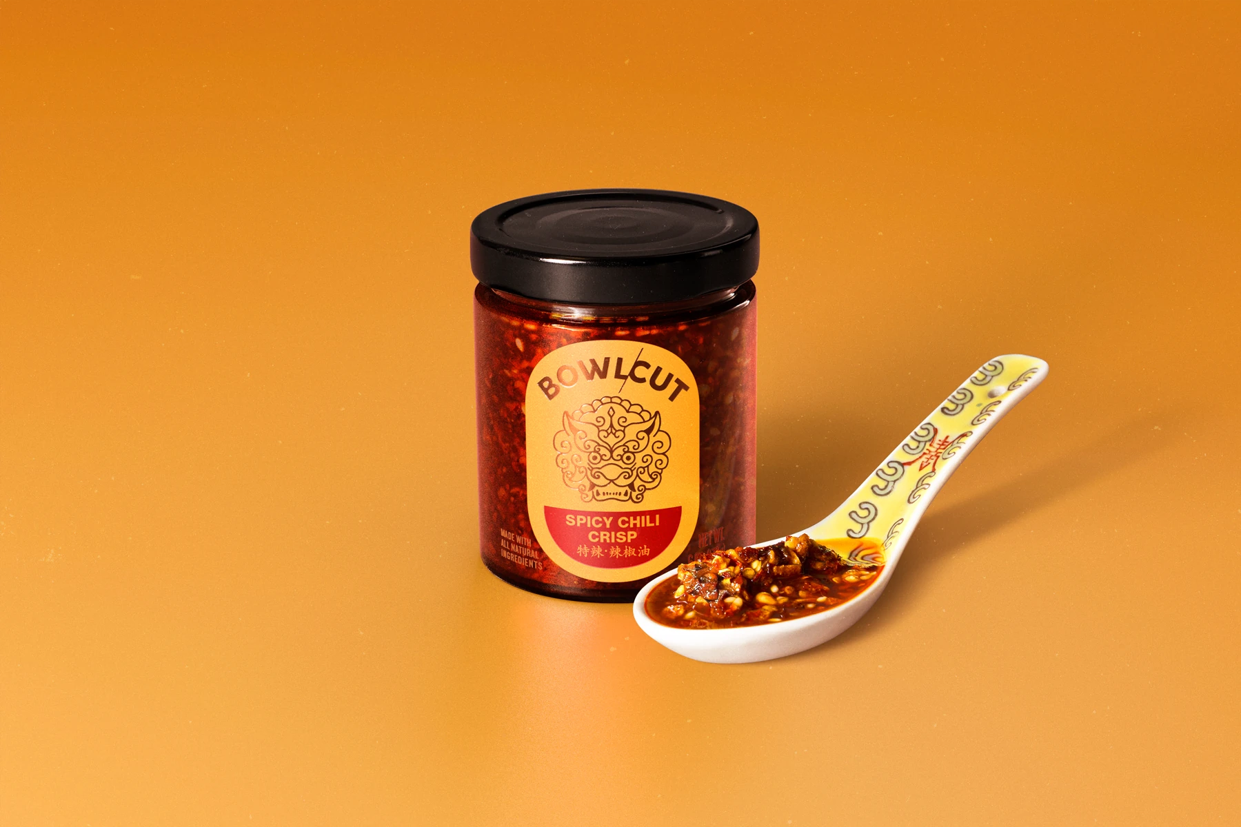 BowlCut chili crisp on a spoon