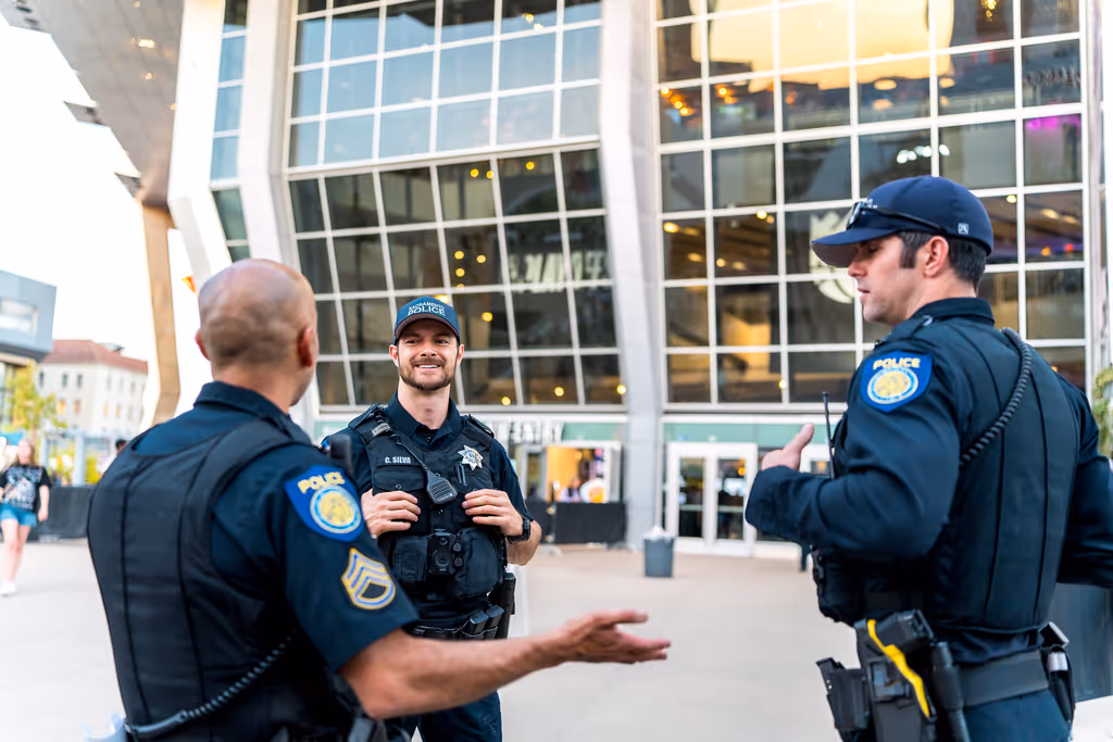3 officers chatting