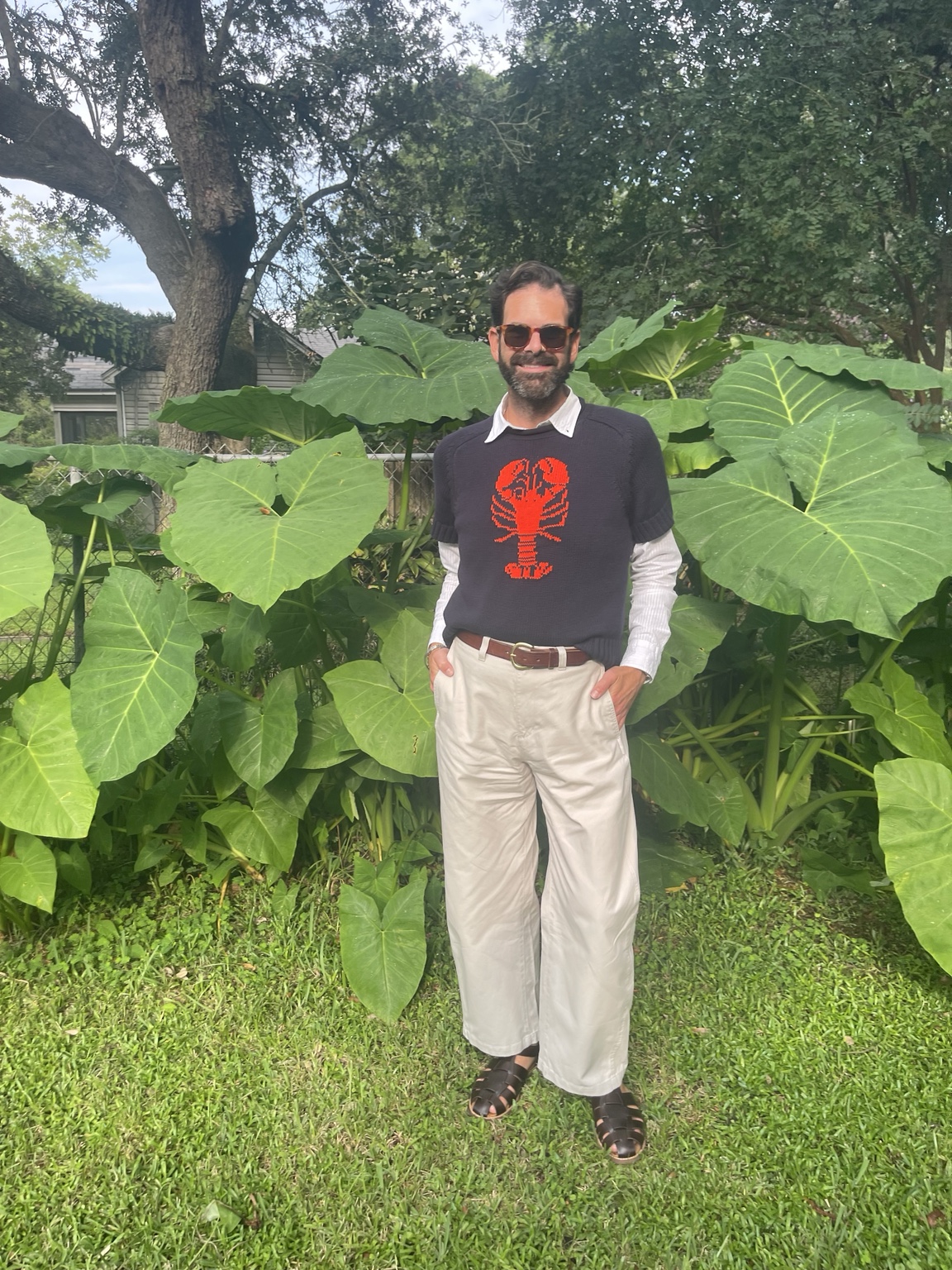 Dr. Lucas Hall standing in a Pensacola garden