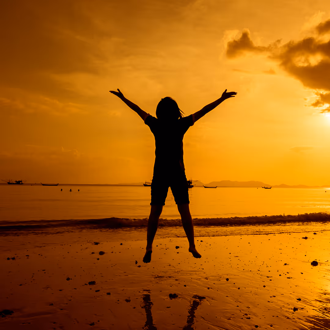 Woman jumping. Kairos Counseling & Family Therapy in Dallas tx and new mexico