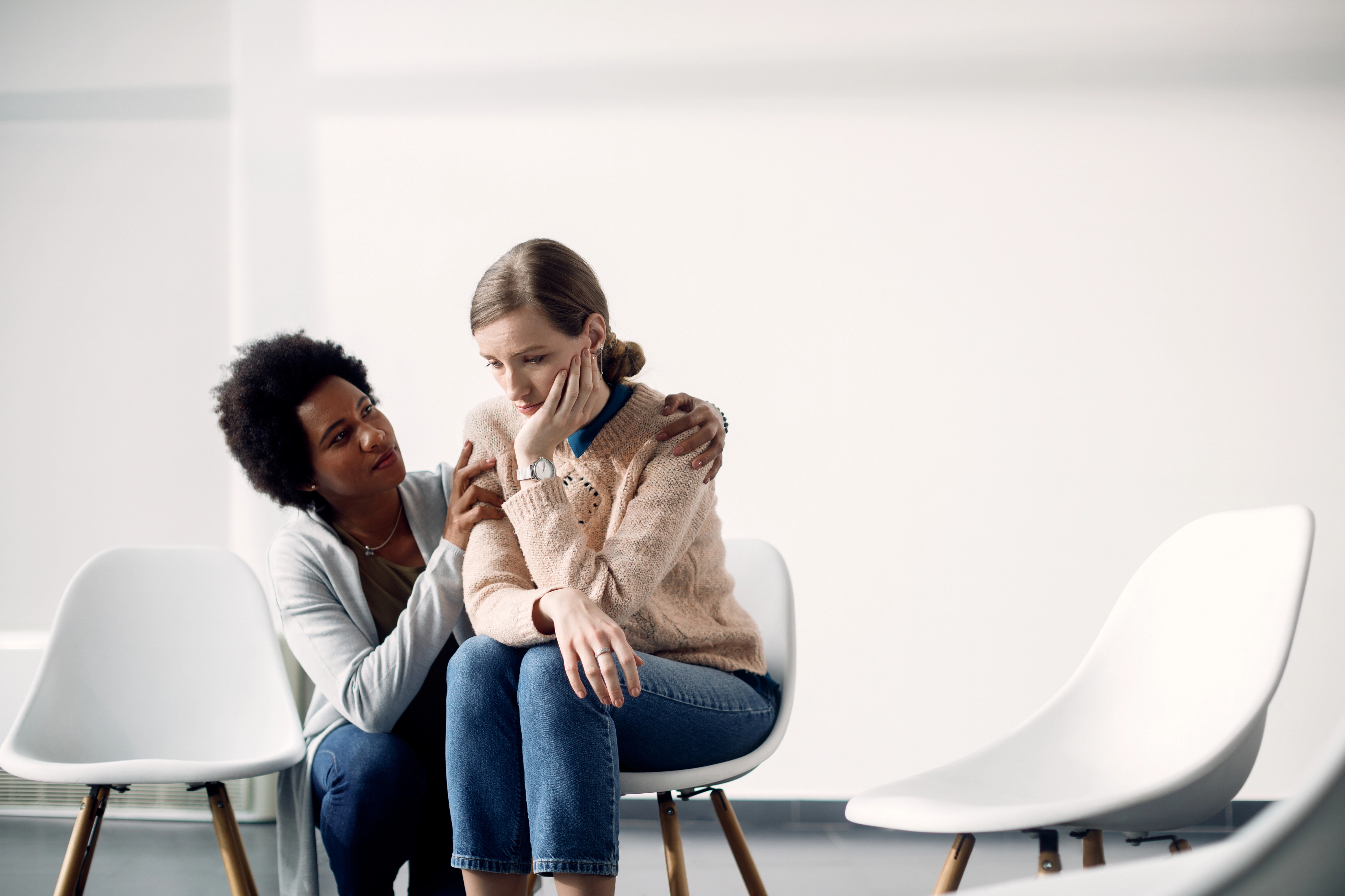 A therapist caring for a client during therapy