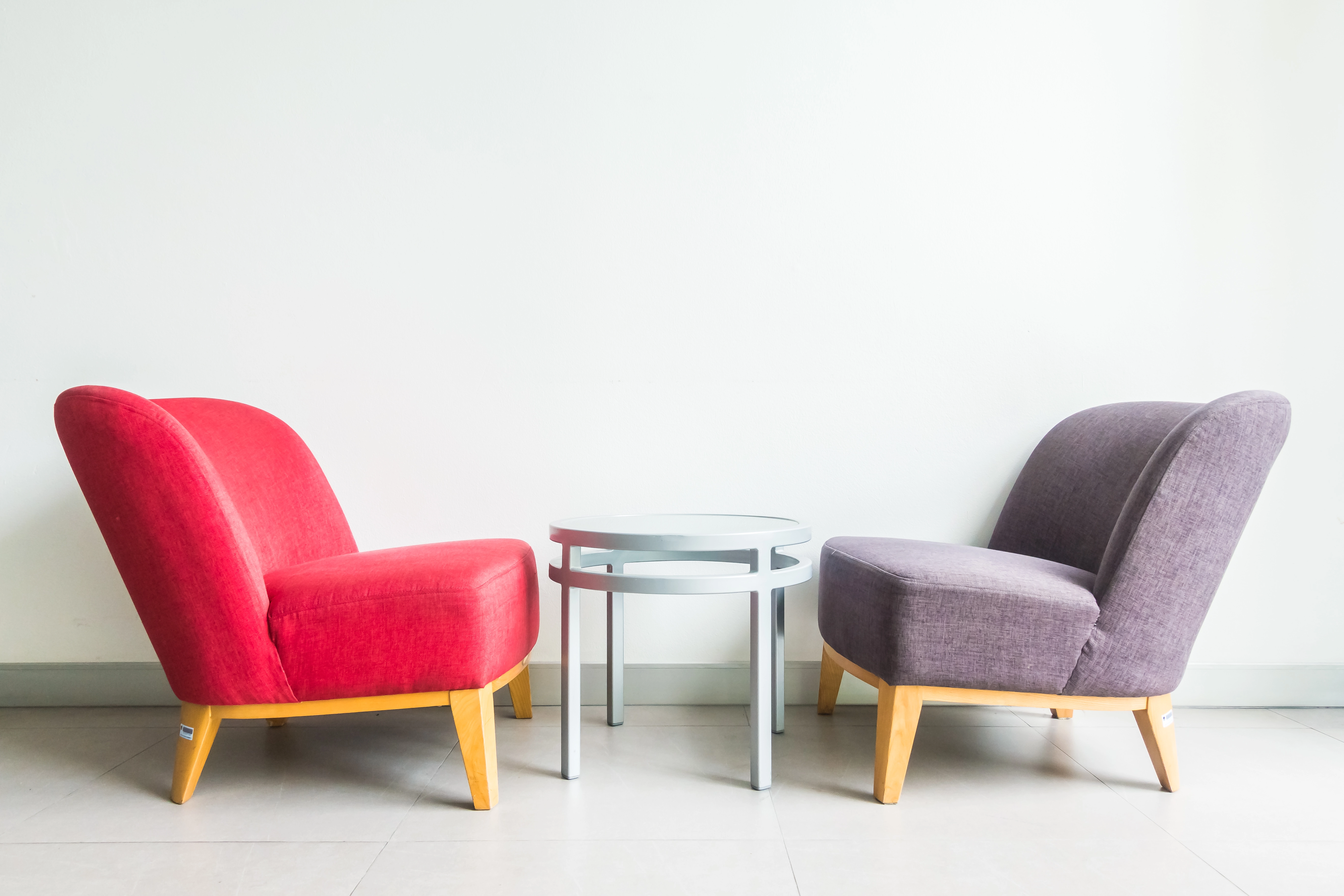 Two sofa chairs facing each over 