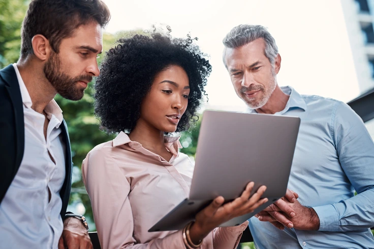A diverse team of professionals collaborating on a workforce development plan