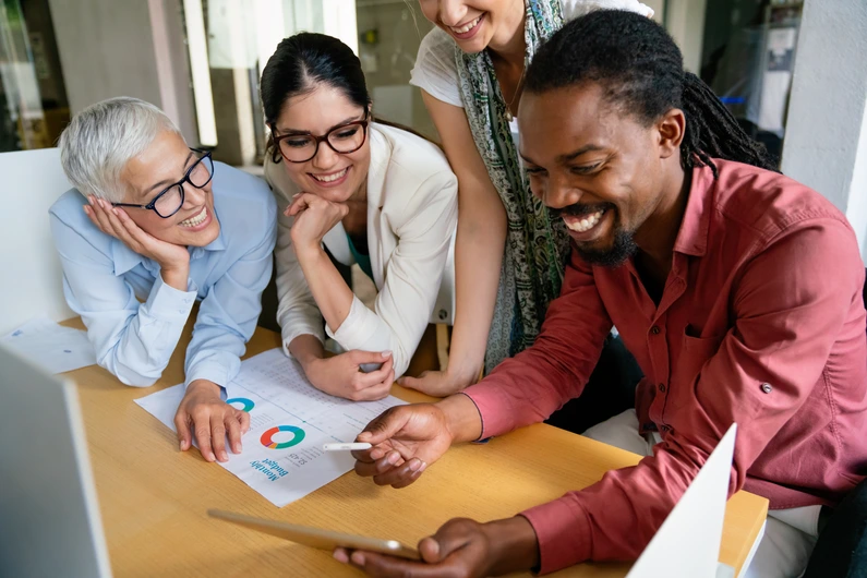 happy employees demonstrating employee engagement