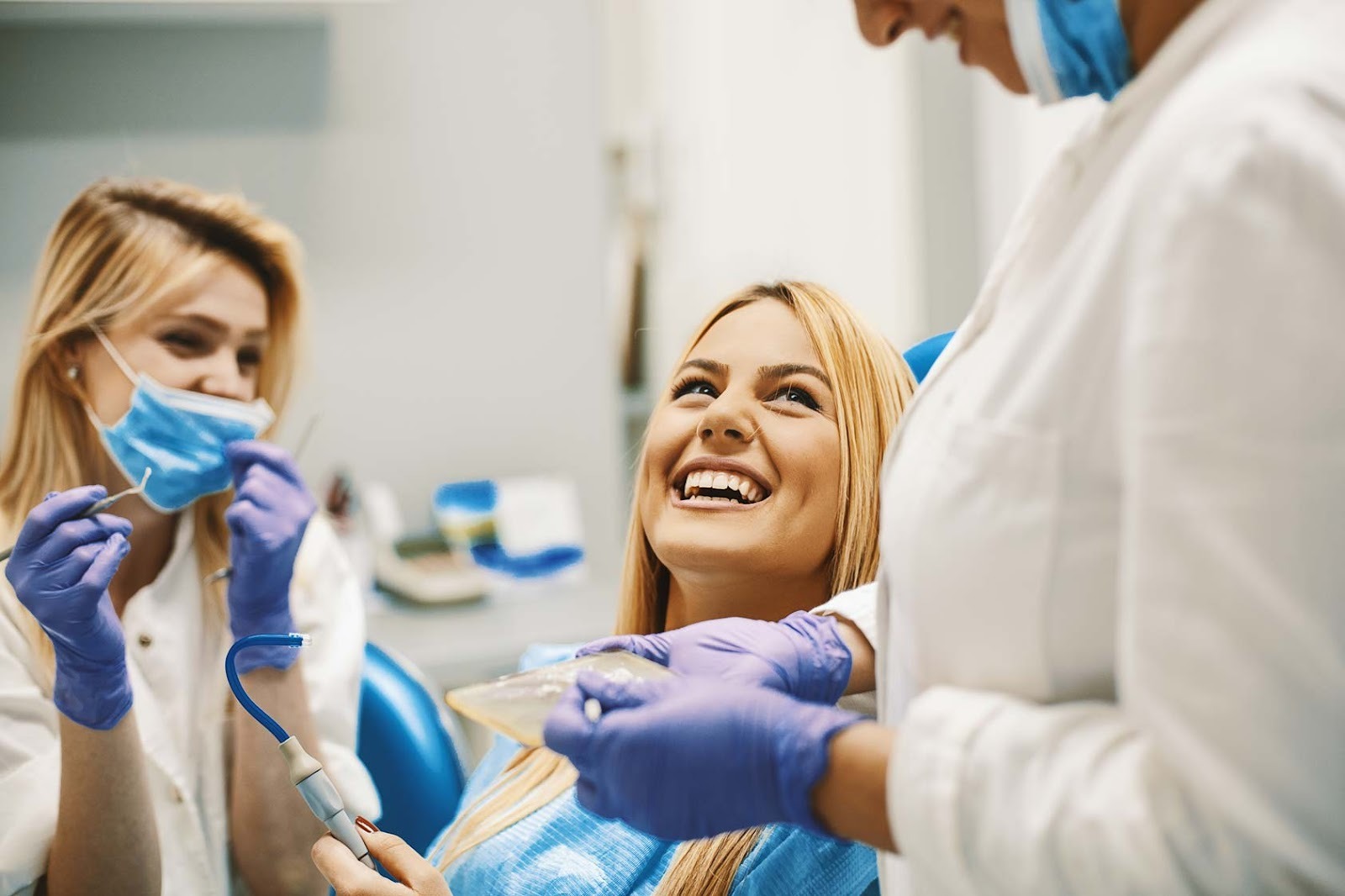 Smiling patient during a dental consultation at Church View Dental in Upminster, discussing treatment options in a calm clinical setting