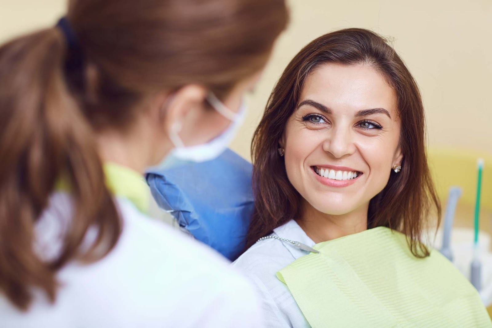 Patient smiling during a routine dental check-up with dentist at a dental practice in Upminster