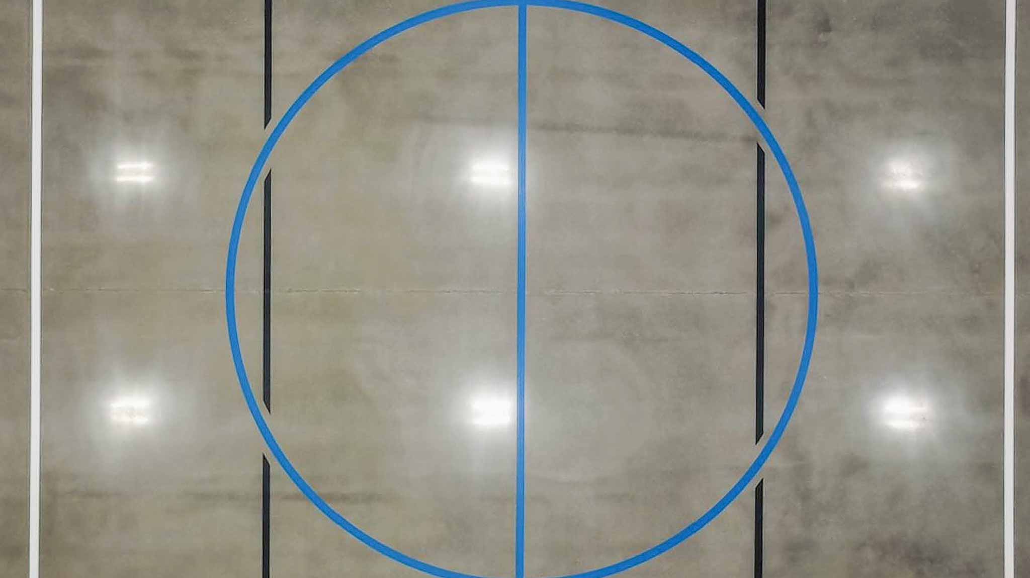 Court line striping on polished concrete