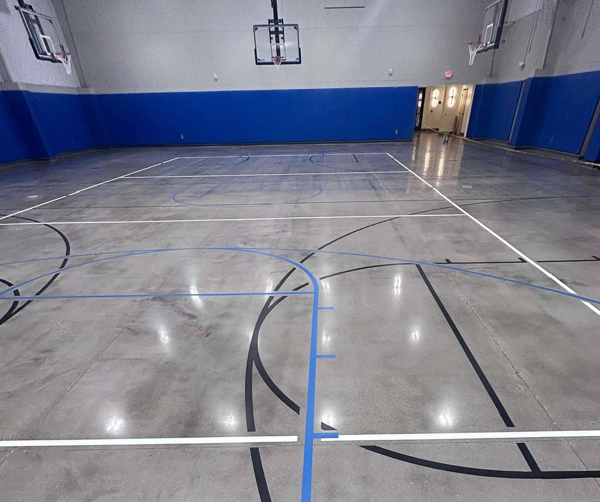 Line striping on a polished concrete surface