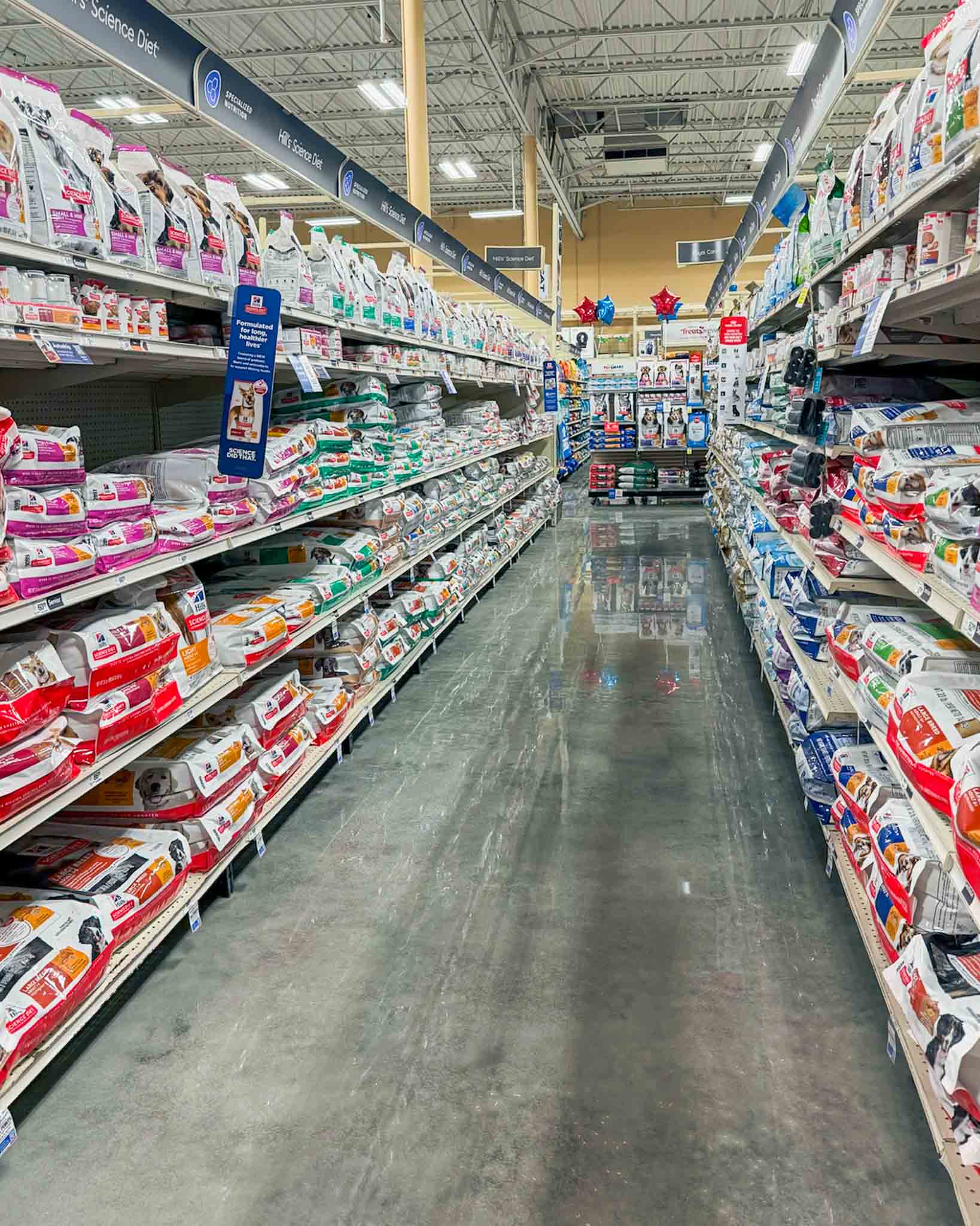 Finished polished concrete floor in an active commercial retail environment.