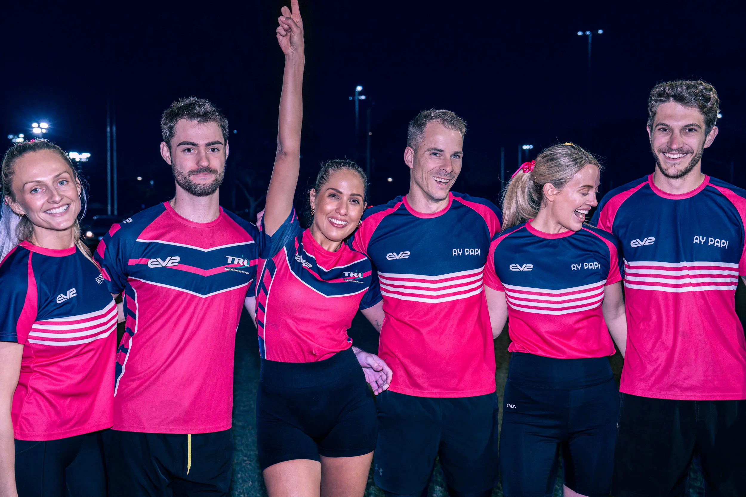 Team celebrating TRL touch rugby league