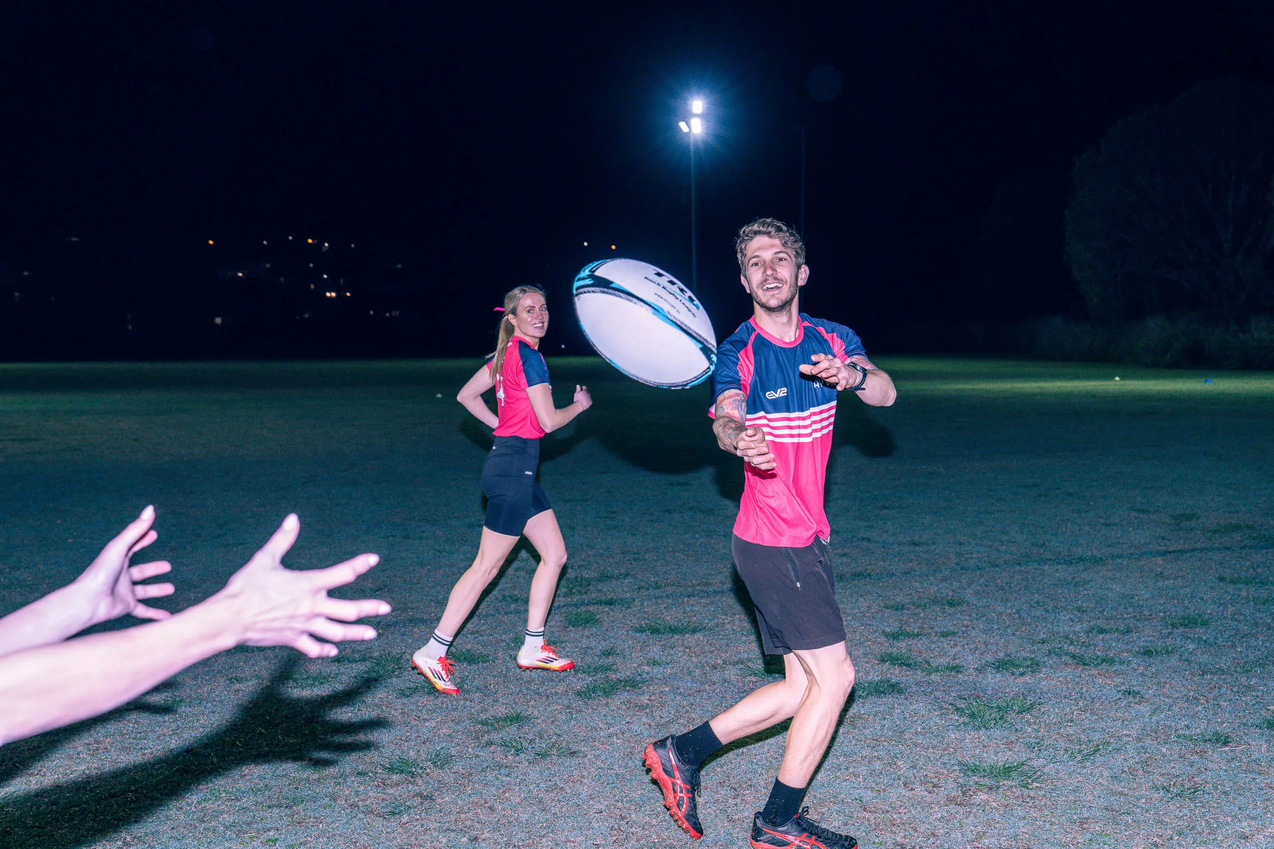 Person passing ball TRL social touch football game