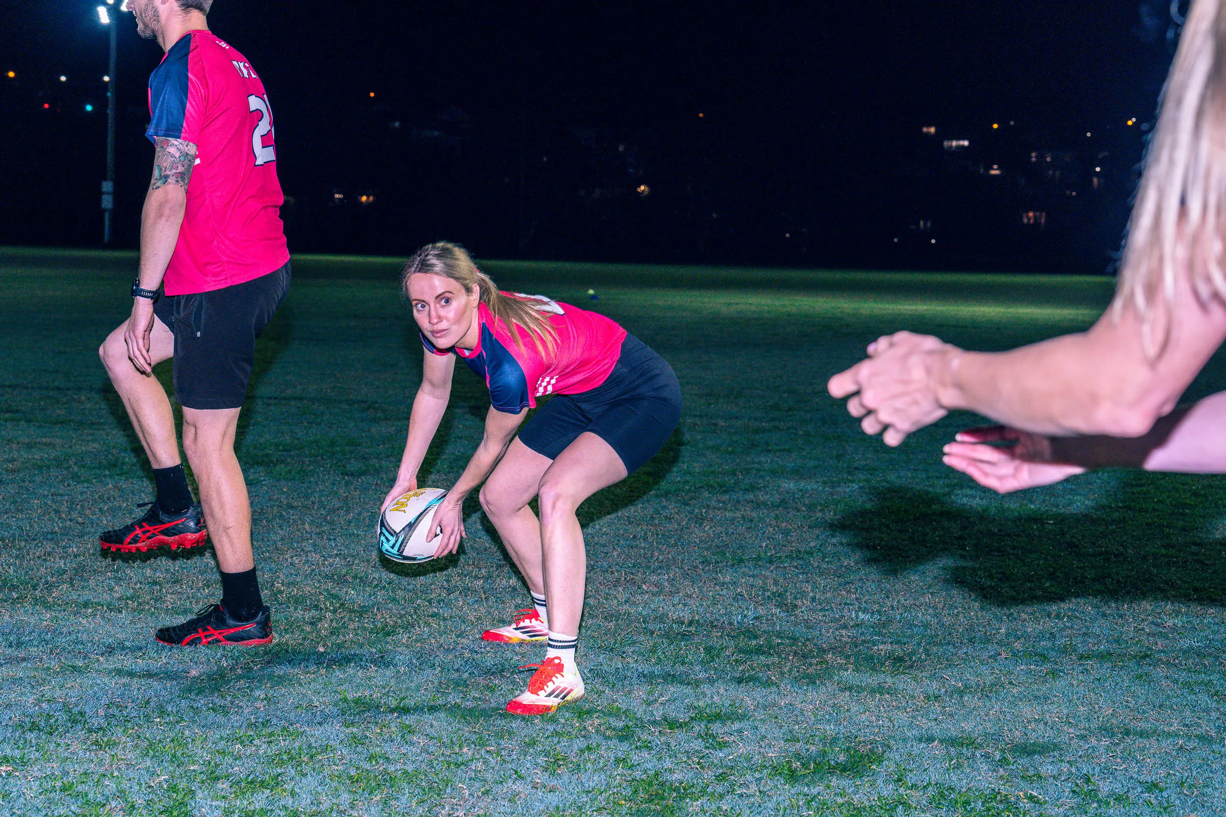 Person passing ball TRL social touch football game