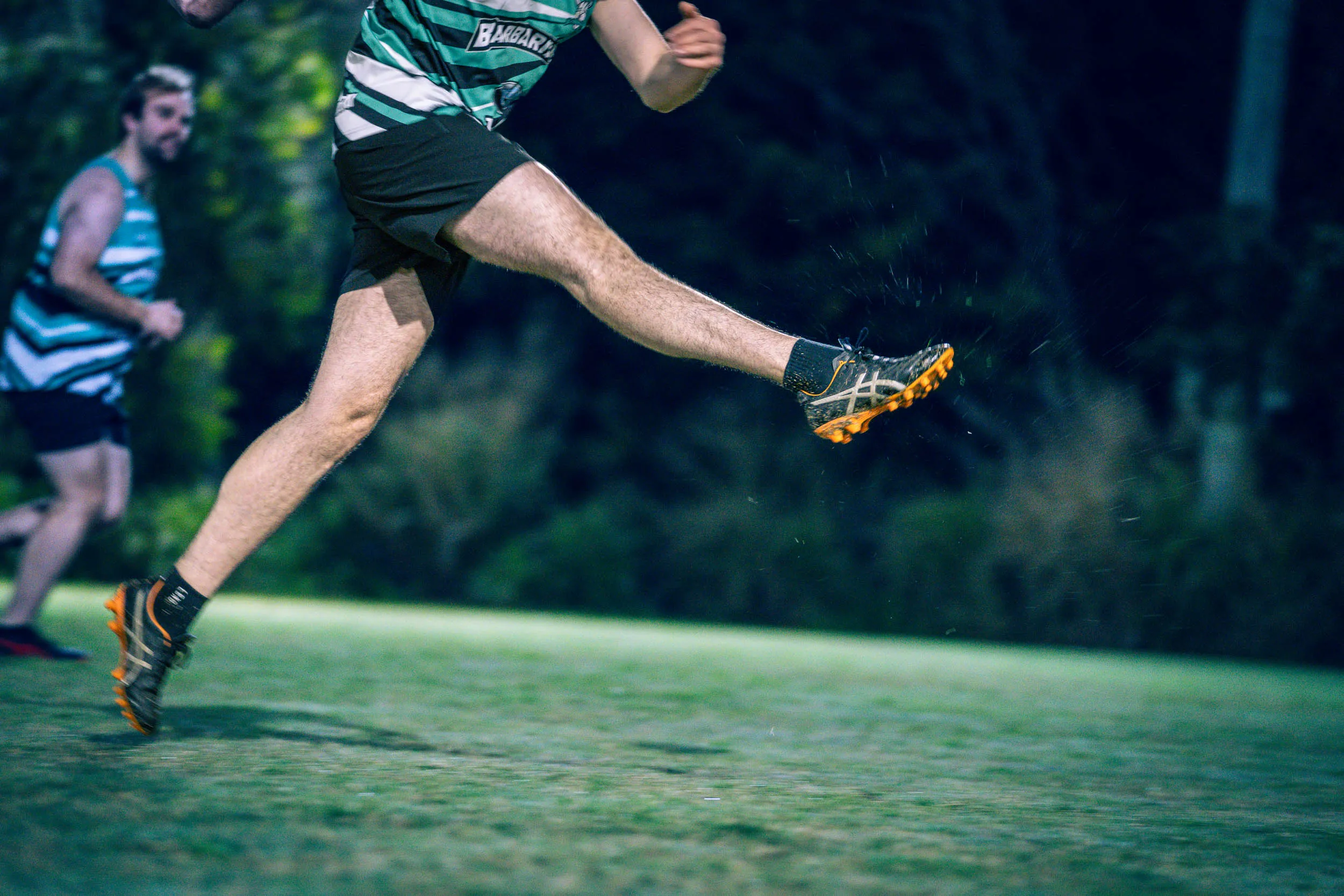 Person kicking ball TRL social touch football game