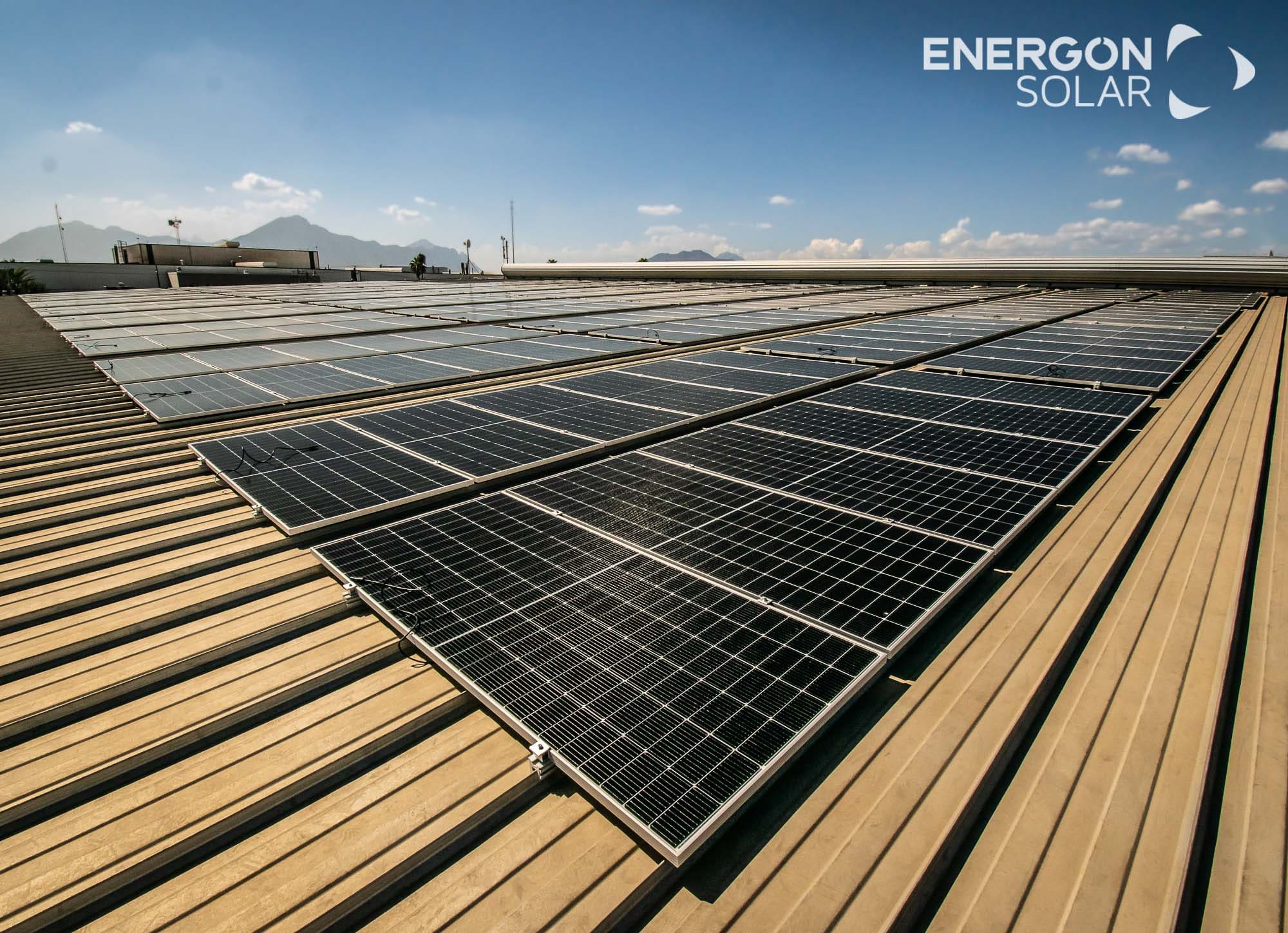 image of rooftop solar panels against a vibrant urban skyline