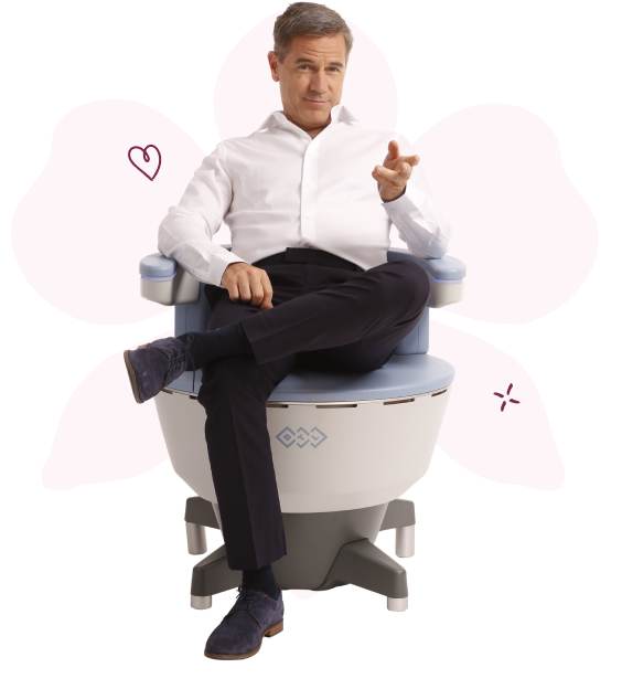 Professional sitting casually on EmSella machine for pelvic floor treatment