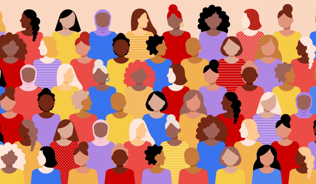 Diverse crowd of stylized women in colorful shirts, representing inclusivity