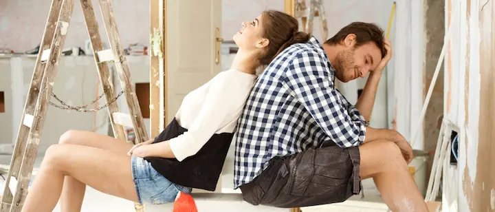 an image of an unhappy couple who are tired of DIY